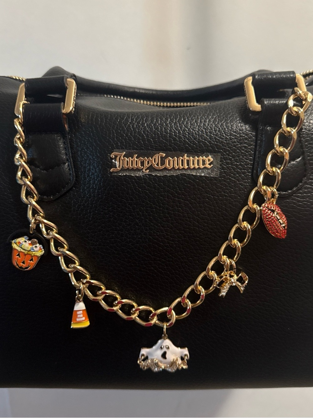 Juicy Couture Black Faux Leather Satchel with Gold Charm Chain